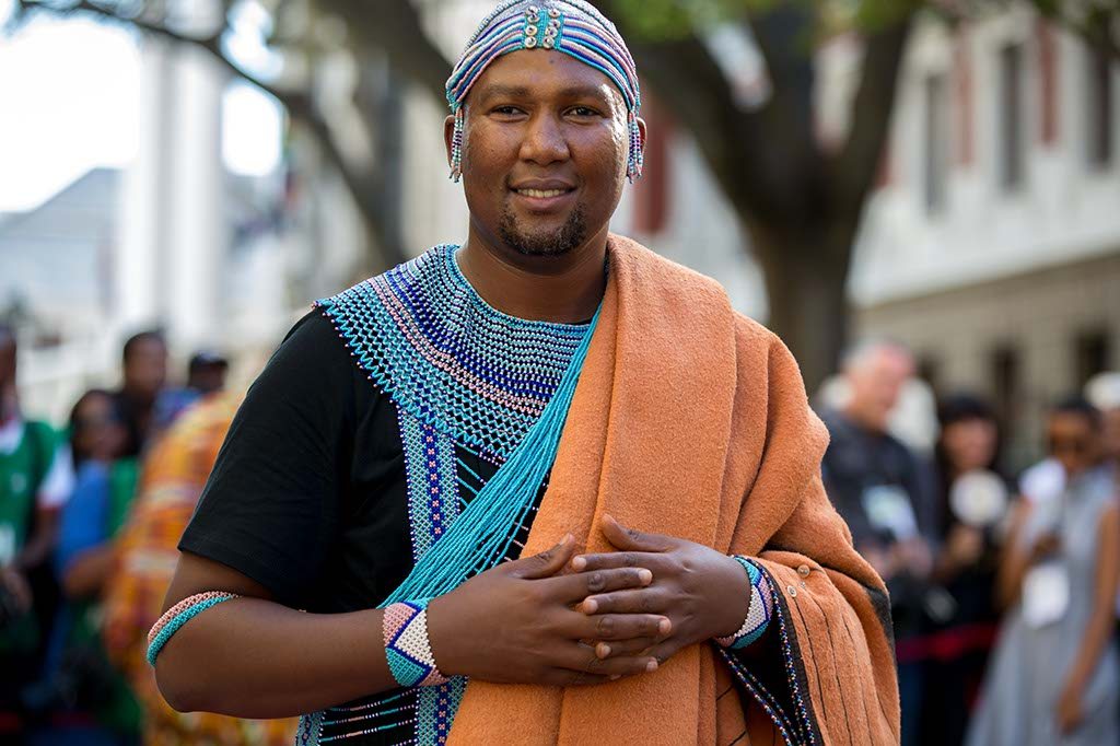 Nelson Mandela's grandson Mandla mandela on the red carpet outside parliament during the 2013 SONA