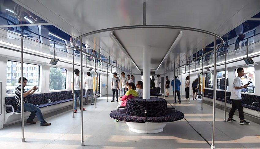 Onlookers allowed to board TEB to get a feel of its large space. Transit Elevated Bus