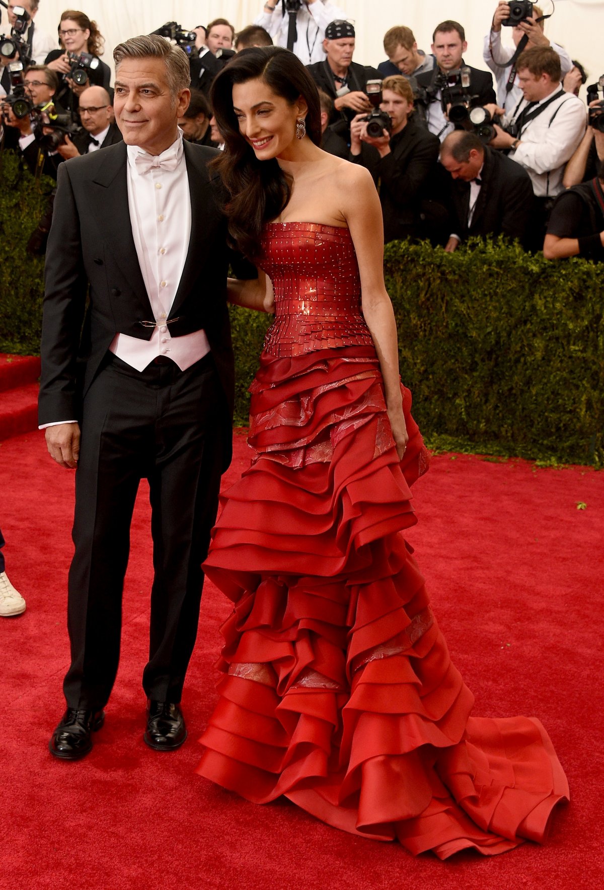 george-and-amal-clooney-who-was-wearing-a-john-galliano-for-maison-margiela-gown-in-the-color-of-the-night